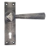FROM THE ANVIL 73112 - ANTIQUE PEWTER STRAIGHT SPRUNG DOOR LEVER ON LOCK BACKPLATE